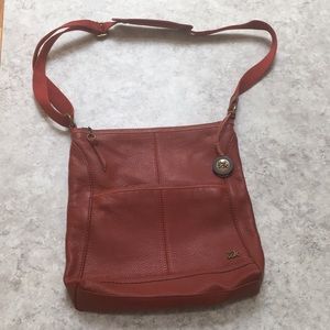 Like NEW! The Sak burnt sienna leather purse.